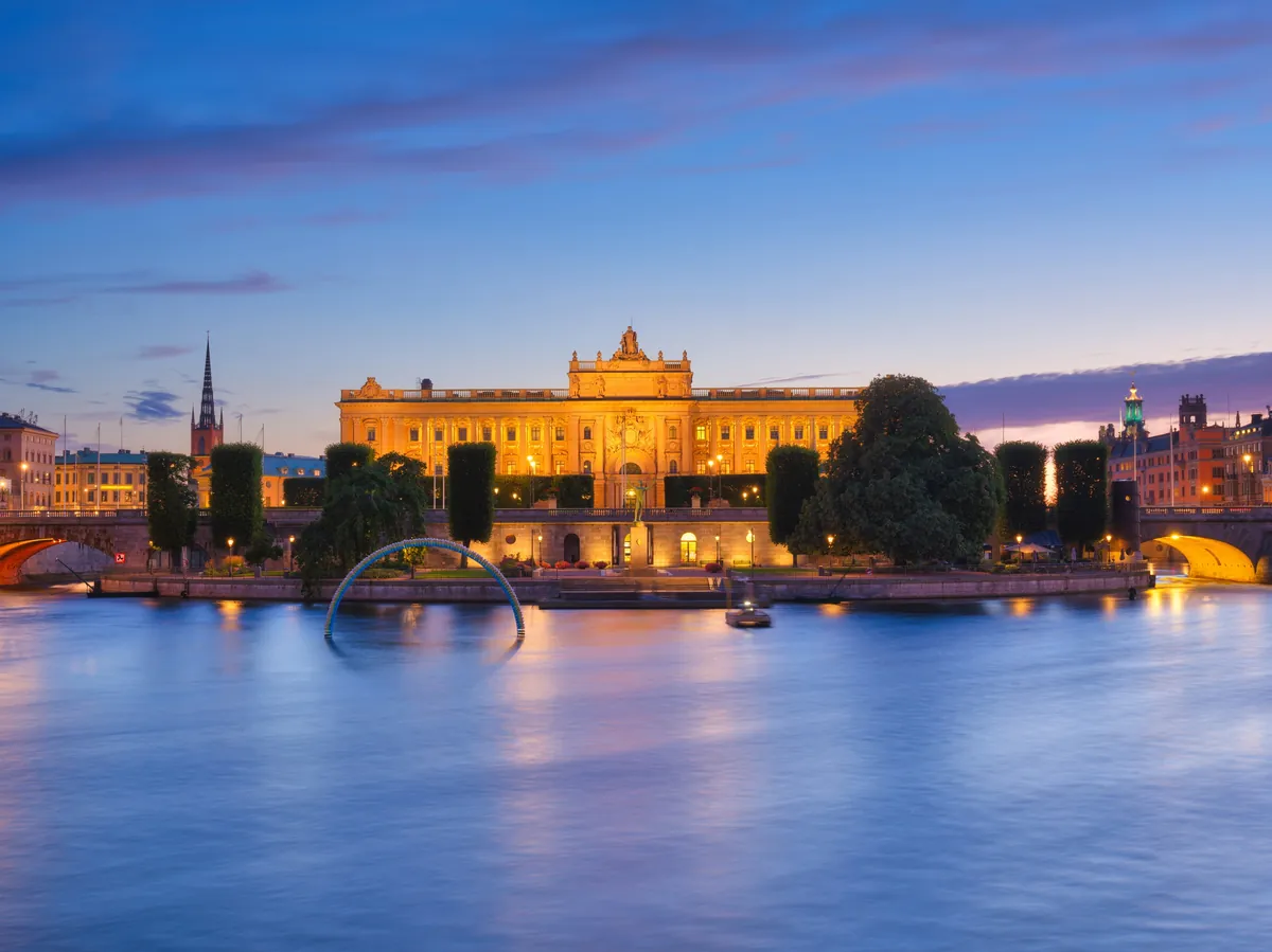 The Royal Palace in Stockholm across the water at dusk